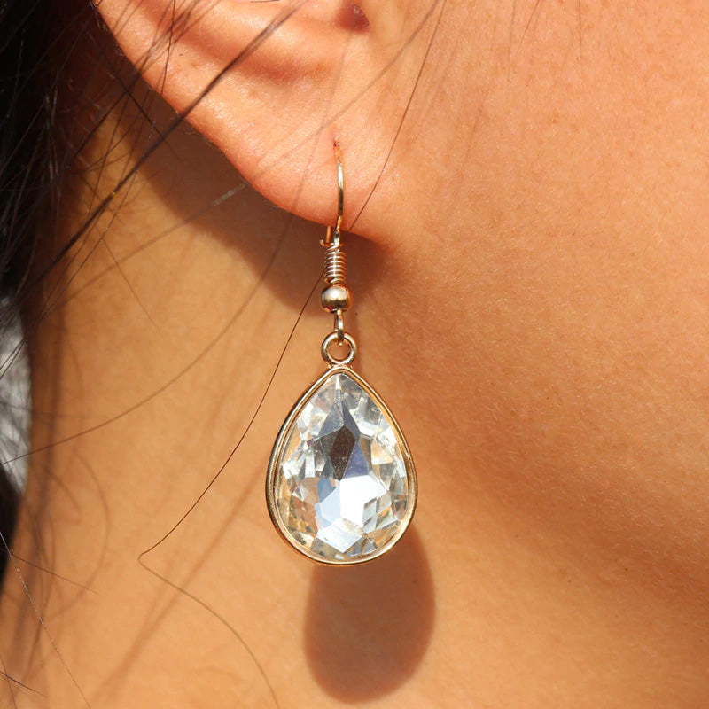 WHITE STONE WITH GOLDEN BASE EARRING