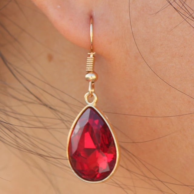 RED STONE WITH GOLDEN BASE EARRING