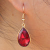RED STONE WITH GOLDEN BASE EARRING