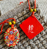 Paper Mache Pendants with Warli Art in Multi Colored Cotton Thread