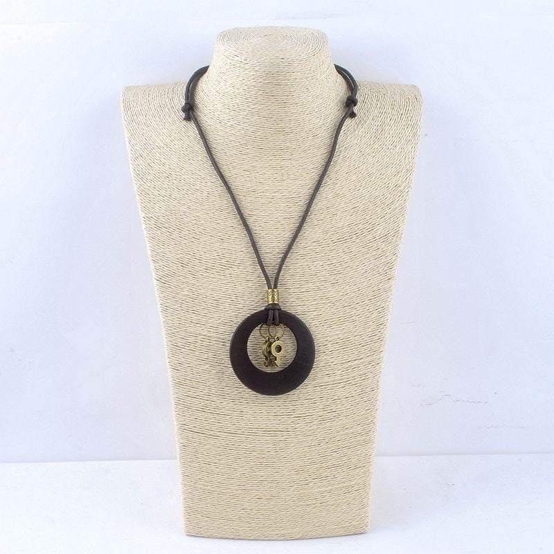 Wooden Pendant with Male Female Charm